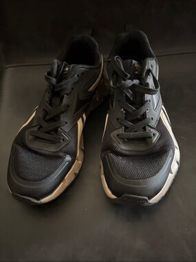 Reebok women’s Black Athletic Galaxy Sneakers with Beige Accents